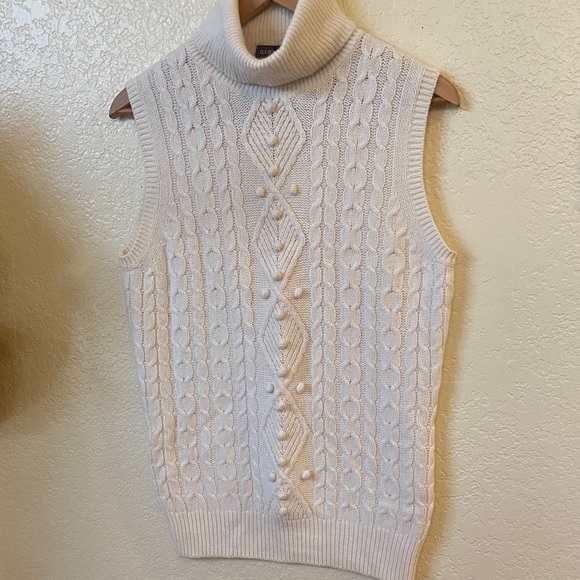 George Ivory Sleeveless Turtleneck Sweater - Picture 1 of 9